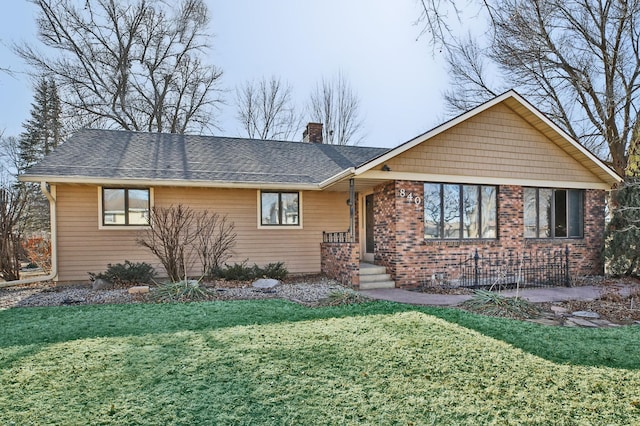 view of front of house with a front yard