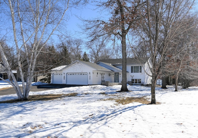 split level home featuring a garage