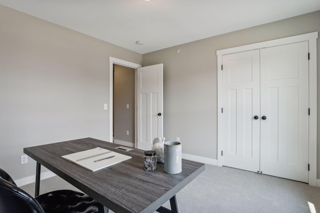 view of carpeted home office