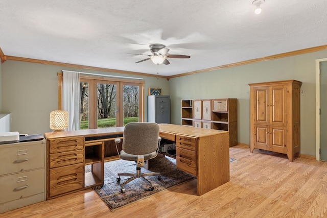 office area with ceiling fan, ornamental molding, a textured ceiling, and light wood-style flooring