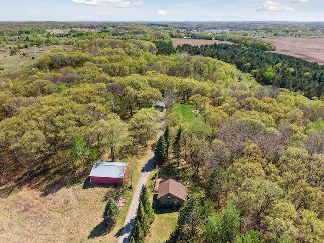 drone / aerial view of a heavily wooded area