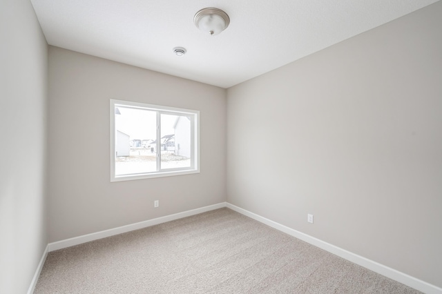 empty room featuring carpet flooring