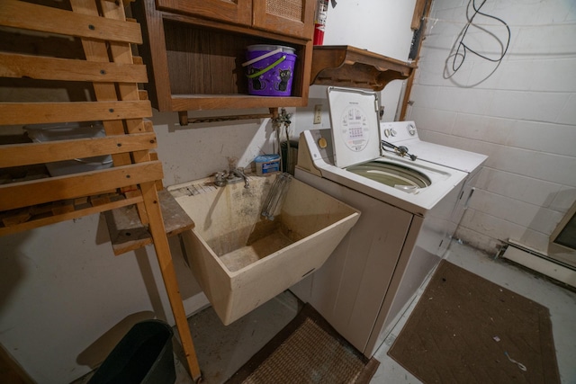 laundry area with sink, washer / clothes dryer, and baseboard heating