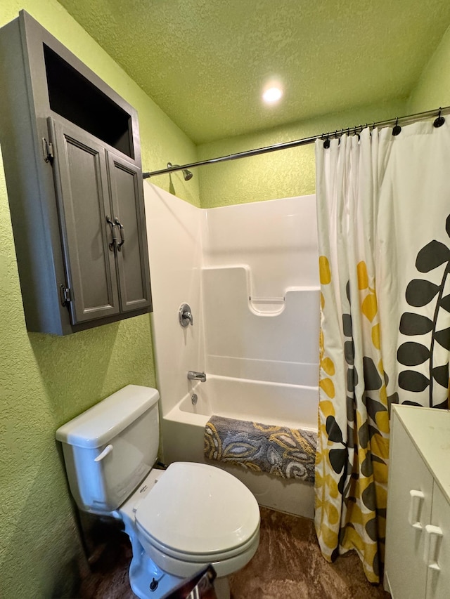 bathroom featuring shower / bath combination with curtain, a textured ceiling, and toilet