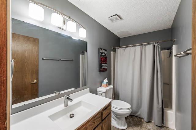 bathroom featuring visible vents, toilet, vanity, shower / tub combo, and a textured ceiling