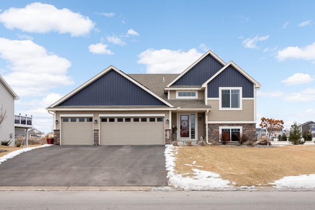 craftsman house featuring a garage