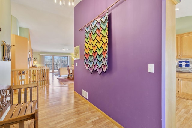 hallway featuring light hardwood / wood-style floors