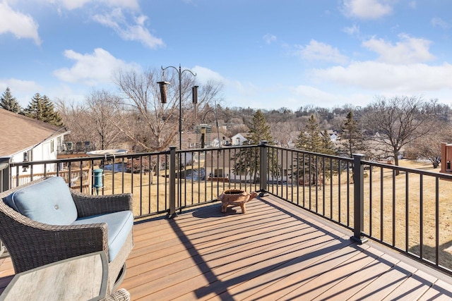 deck with an outdoor fire pit