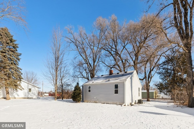 exterior space featuring central AC unit