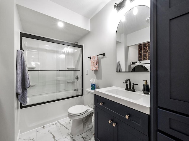 full bath with toilet, marble finish floor, bath / shower combo with glass door, and vanity