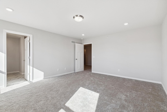 unfurnished bedroom with light carpet