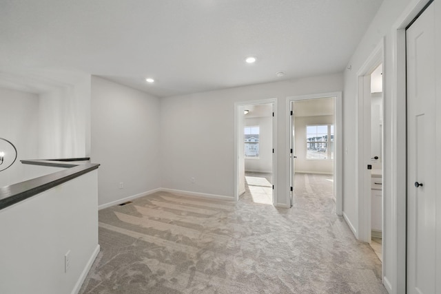 6566 Jody Ave S, Cottage Grove, MN 55016 - unfurnished room featuring baseboards, visible vents, recessed lighting, and light colored carpet