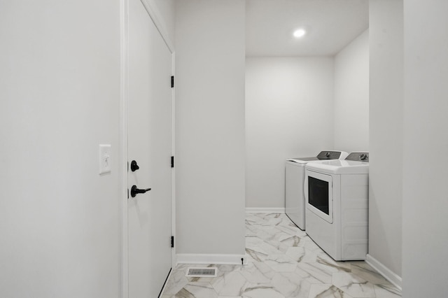 6566 Jody Ave S, Cottage Grove, MN 55016 - clothes washing area featuring laundry area, visible vents, baseboards, marble finish floor, and washer and clothes dryer