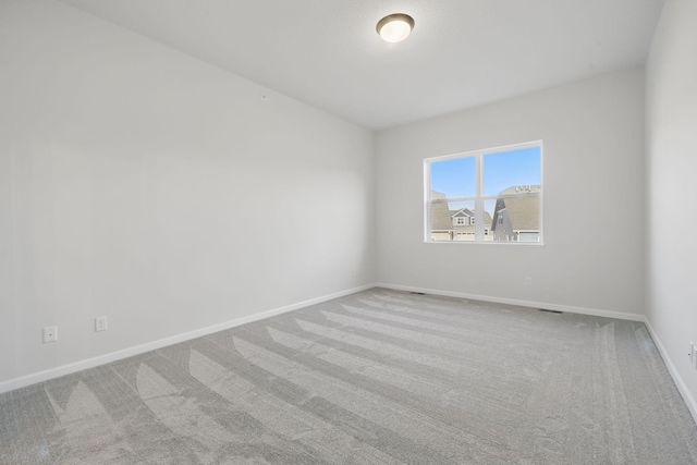 6566 Jody Ave S, Cottage Grove, MN 55016 - carpeted spare room featuring baseboards