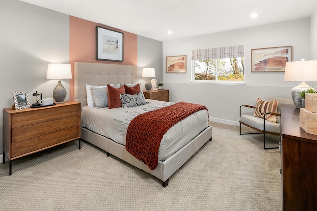 bedroom with recessed lighting, baseboards, and light colored carpet