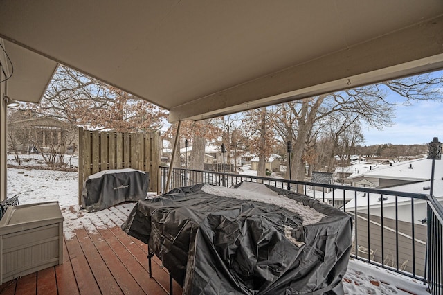 view of snow covered deck