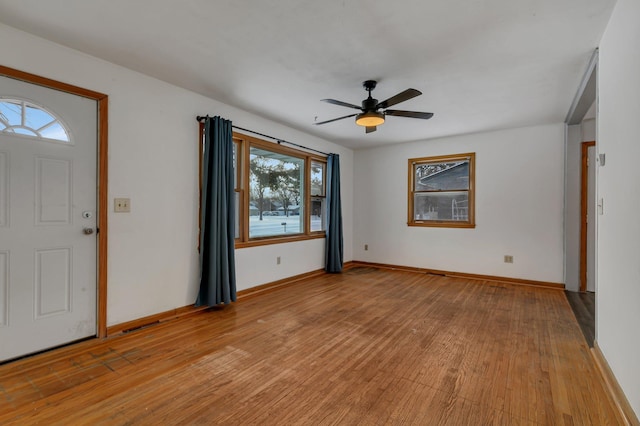 entryway featuring light hardwood / wood-style floors and ceiling fan