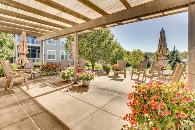 view of patio featuring a pergola