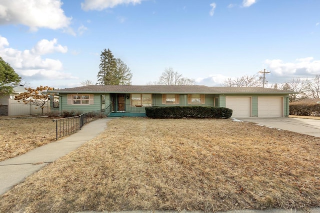 ranch-style home with a garage and a front yard