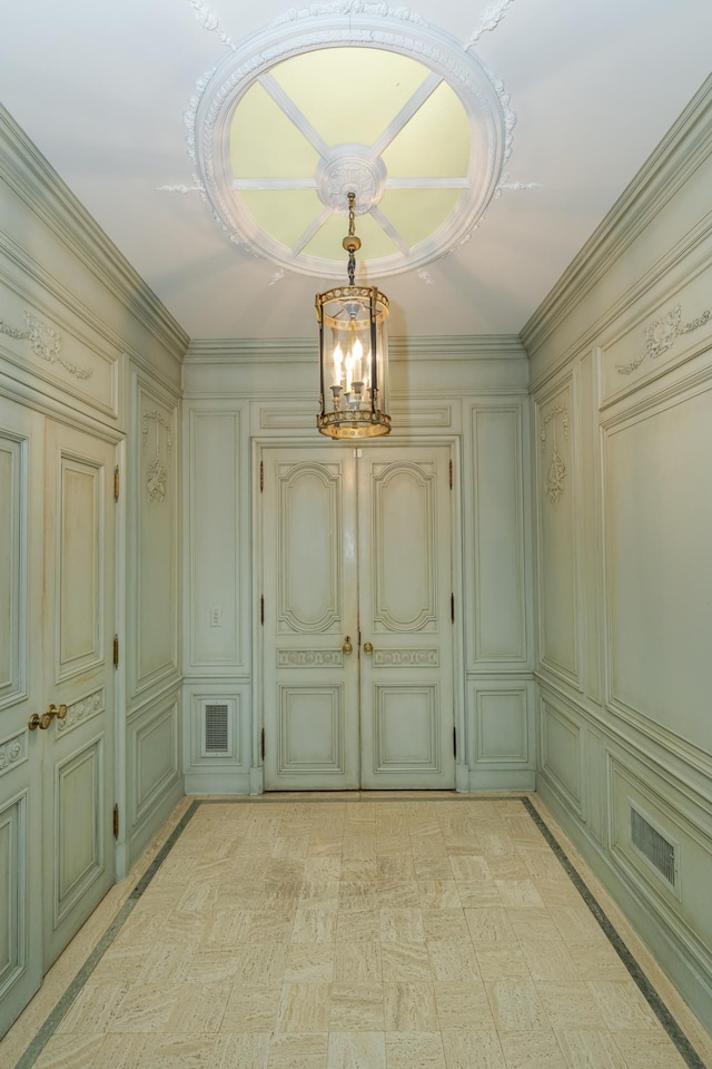 910 Folwell Dr SW, Rochester, MN 55902 - entrance foyer featuring a chandelier, visible vents, and light floors
