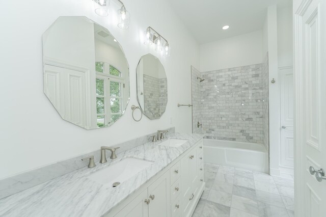 910 Folwell Dr SW, Rochester, MN 55902 - bathroom with bathing tub / shower combination, double vanity, and a sink