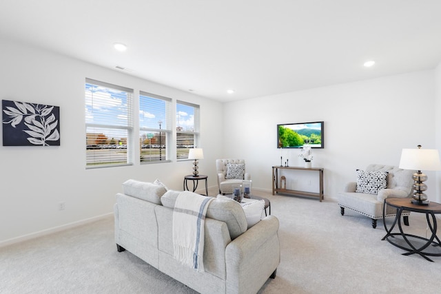 living room featuring light colored carpet