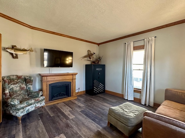 living room featuring ornamental molding, dark hardwood / wood-style floors, and a textured ceiling