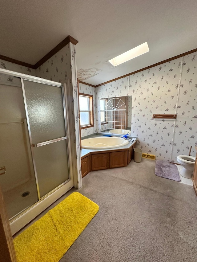 bathroom featuring wallpapered walls, a skylight, a stall shower, crown molding, and a bath