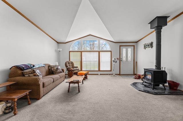 59001 County Highway 8, Sebeka, MN 56477 - carpeted living room with lofted ceiling, a wood stove, and ornamental molding