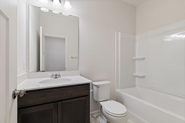 full bathroom featuring vanity, tub / shower combination, and toilet