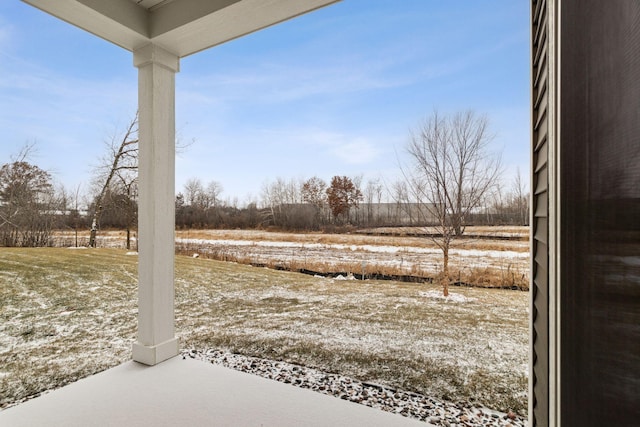 view of yard layered in snow