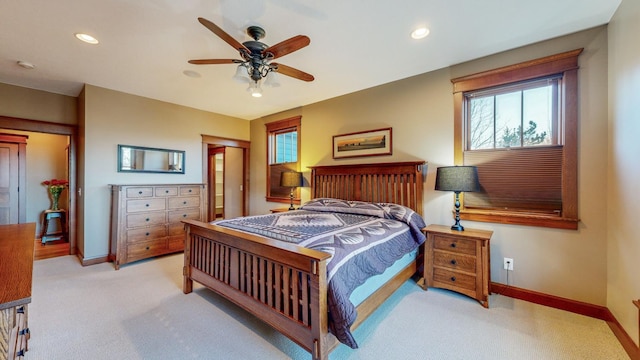 carpeted bedroom featuring ceiling fan