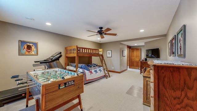 bedroom with ceiling fan and light colored carpet