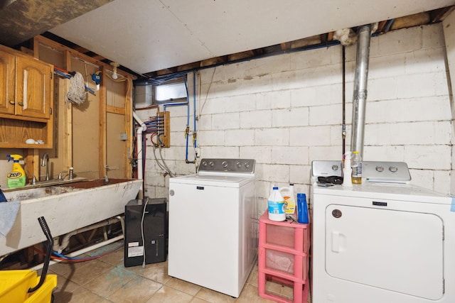 laundry area with separate washer and dryer