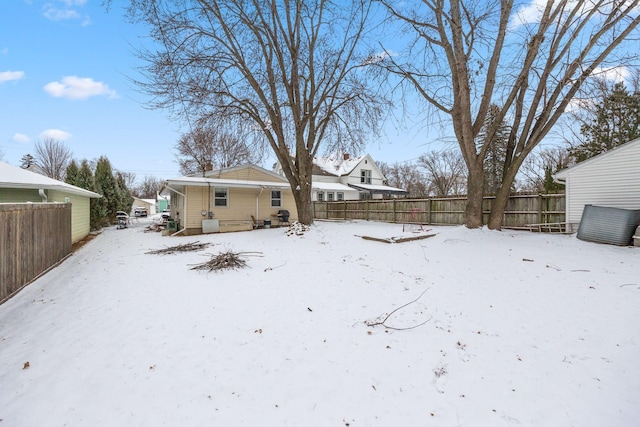 view of yard covered in snow