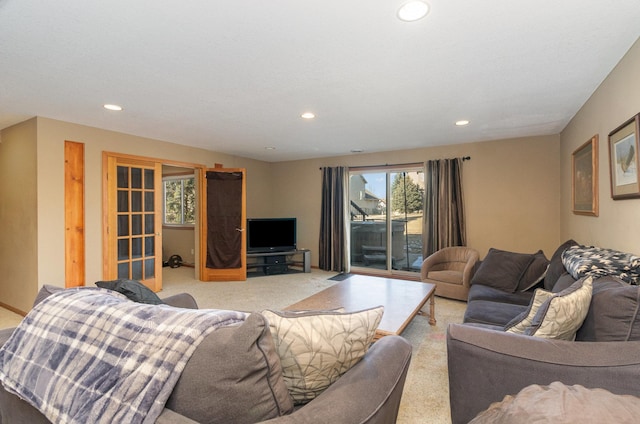 living room featuring light carpet