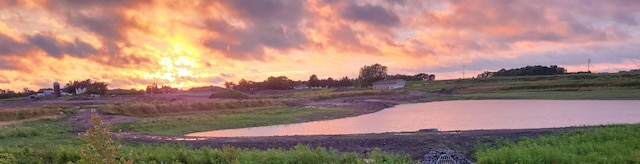 surrounding community with a water view