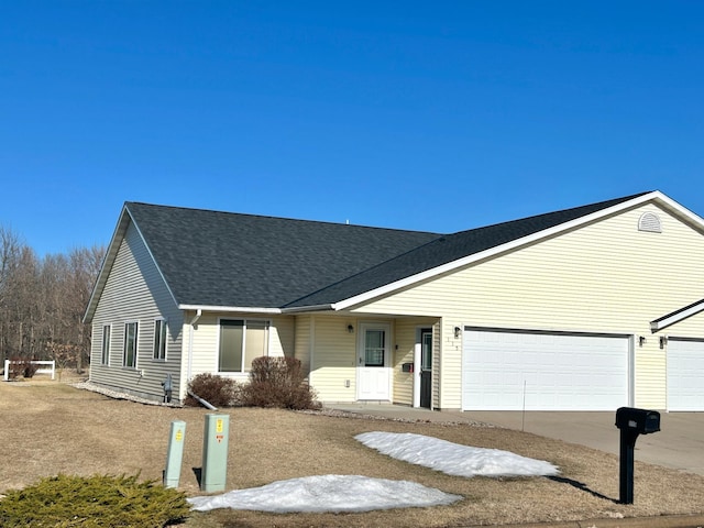 ranch-style house featuring a garage