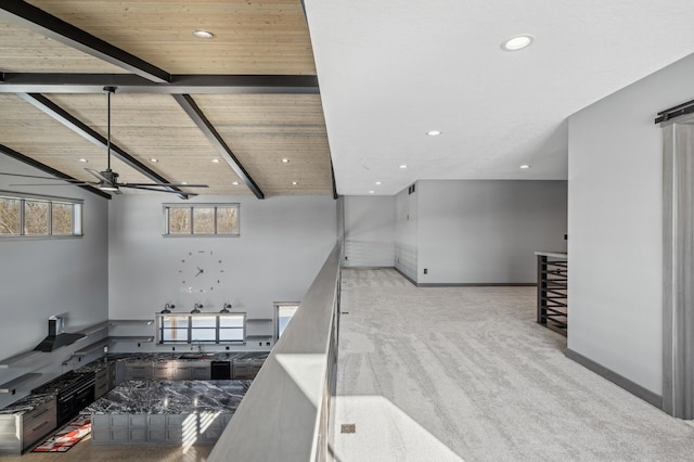 living area with beam ceiling, wooden ceiling, carpet, and baseboards