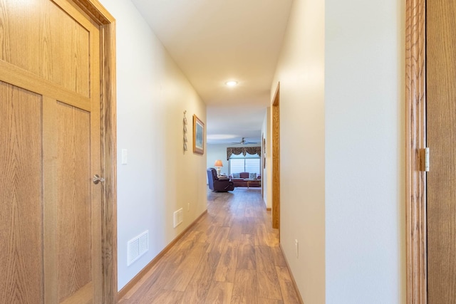 hallway featuring hardwood / wood-style floors