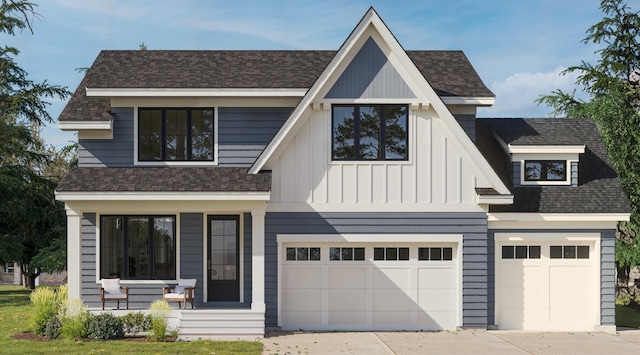 view of front of home with a garage and covered porch