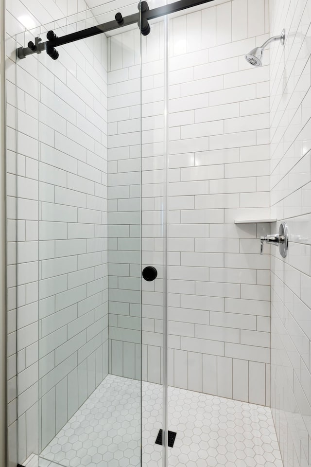 bathroom featuring an enclosed shower