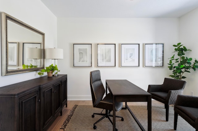 office with light hardwood / wood-style floors