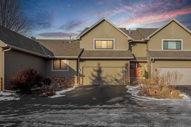 view of front of property with a garage