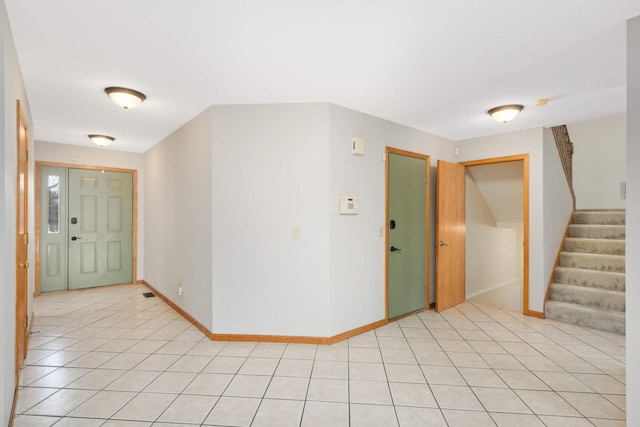 view of tiled foyer entrance