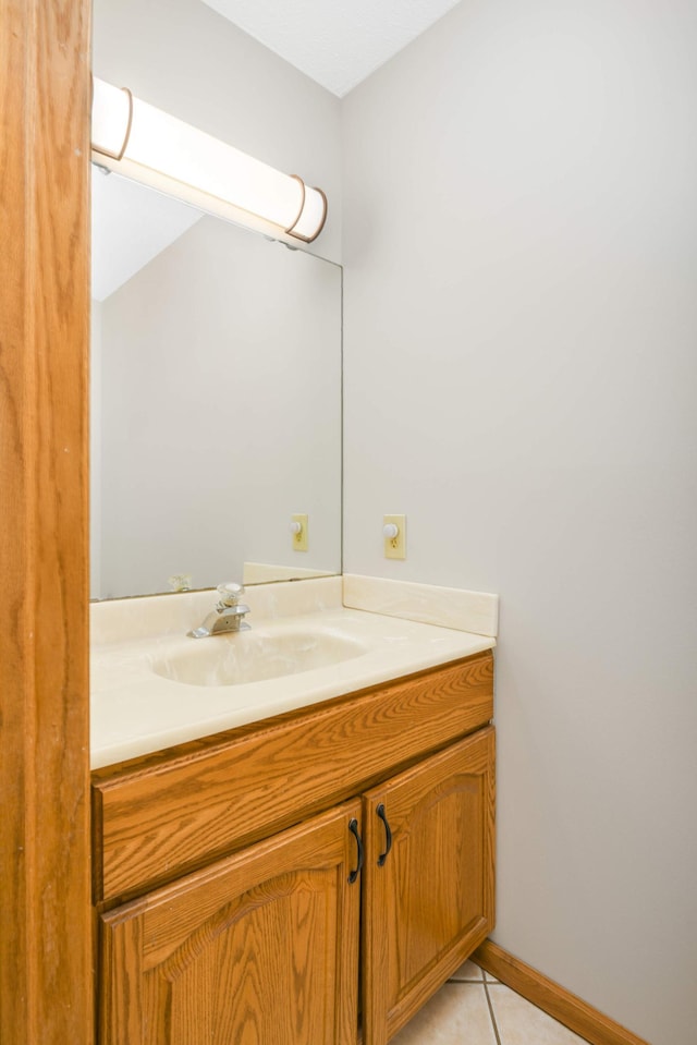 bathroom featuring vanity and tile patterned flooring