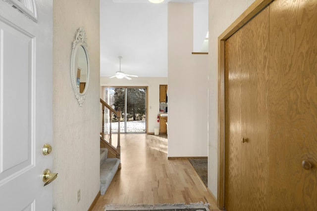 hall with light wood-type flooring