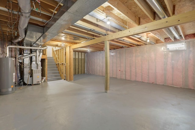 basement with heating unit and water heater