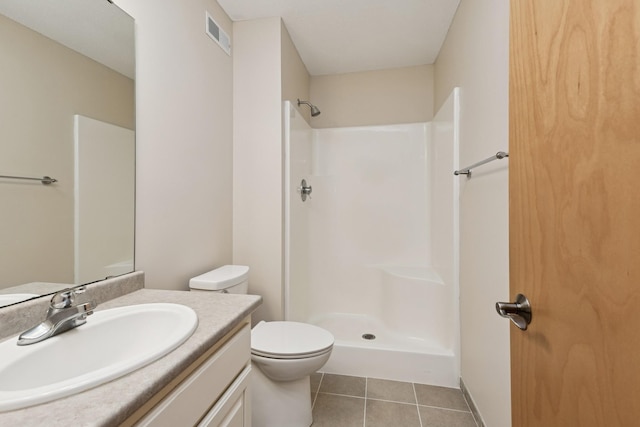 full bath with tile patterned flooring, toilet, visible vents, vanity, and a shower