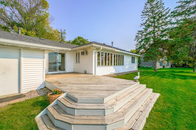 wooden deck featuring a yard